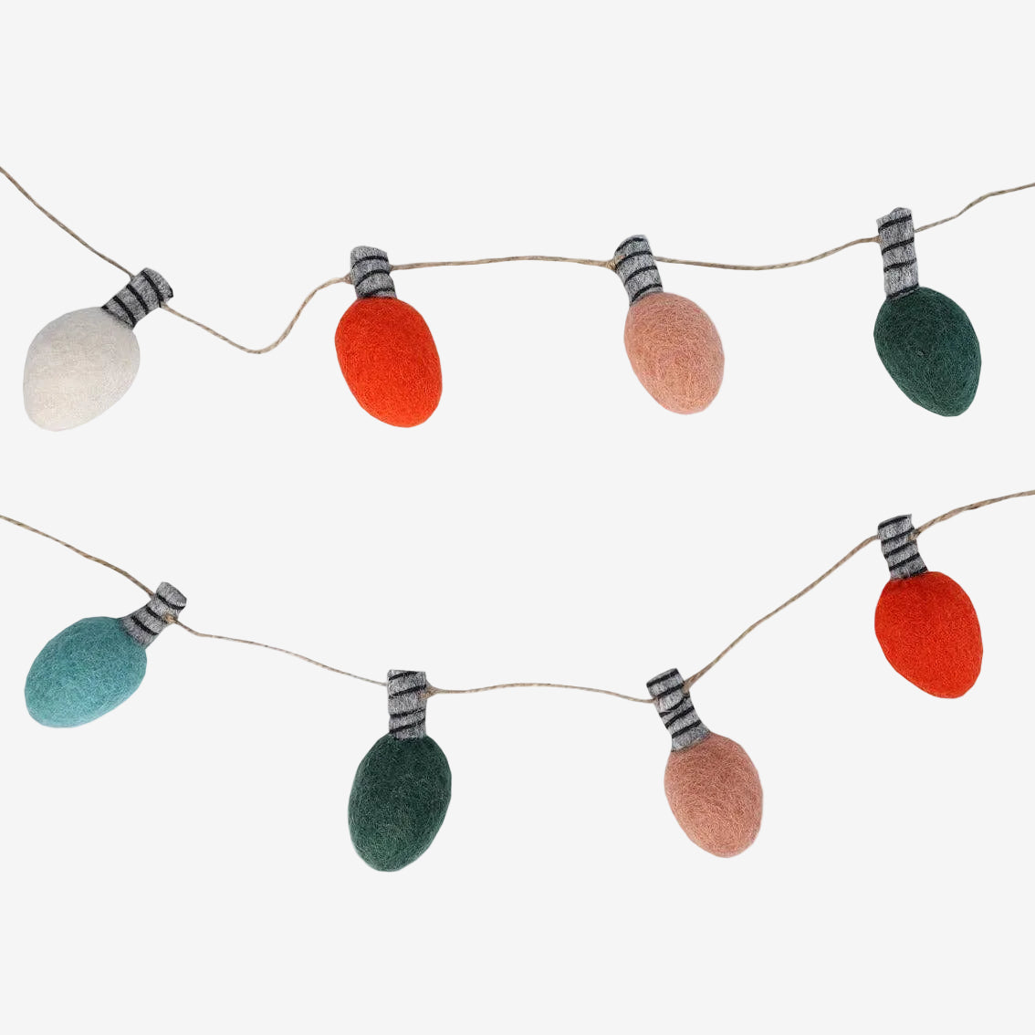 String of colorful felt light bulbs on a white background