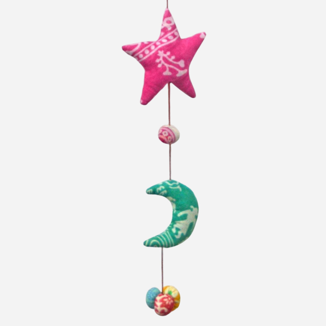 Decorative colourful hanging star and moon on a white background