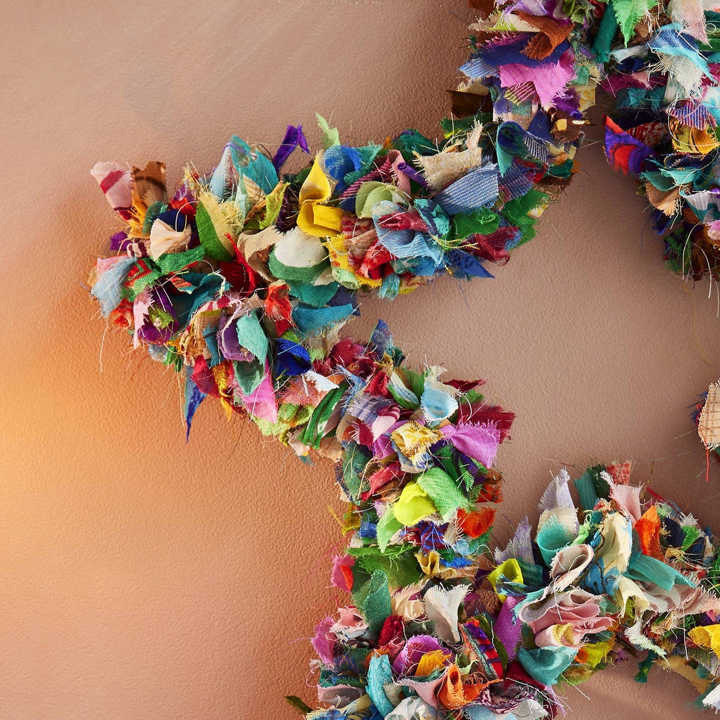 Colorful decorative recycled sari fabric star-shaped wreath