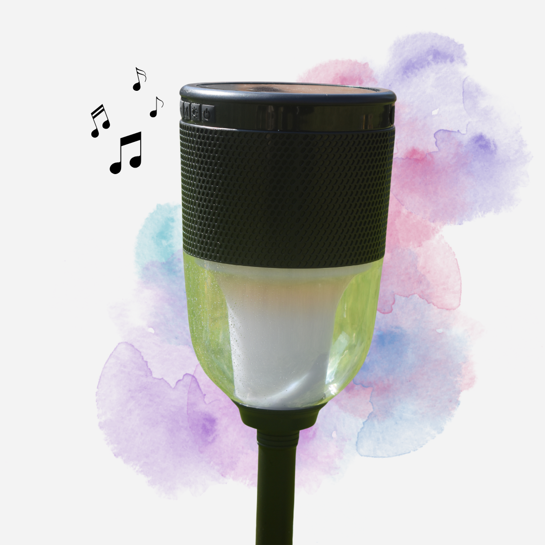 colour-change lantern and speaker with ground spike with colourful background and black musical notes