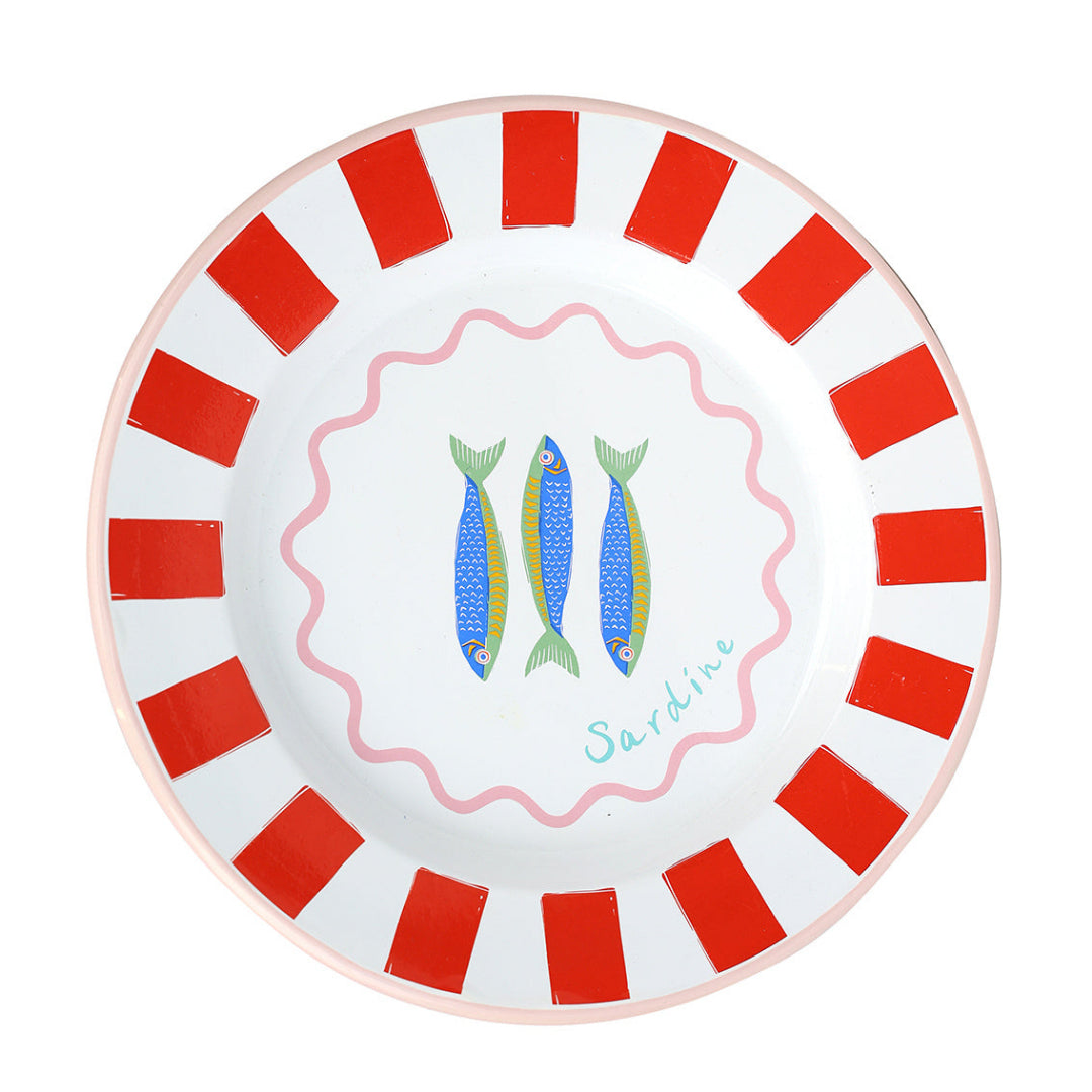 Round plate with red and white striped border and fish illustration on a white background