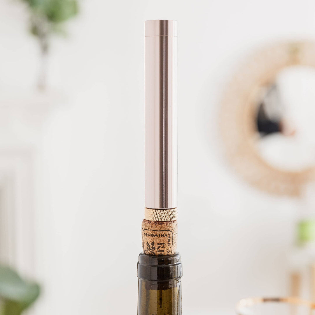 air pumpcorkscrew with cork on a blurred background