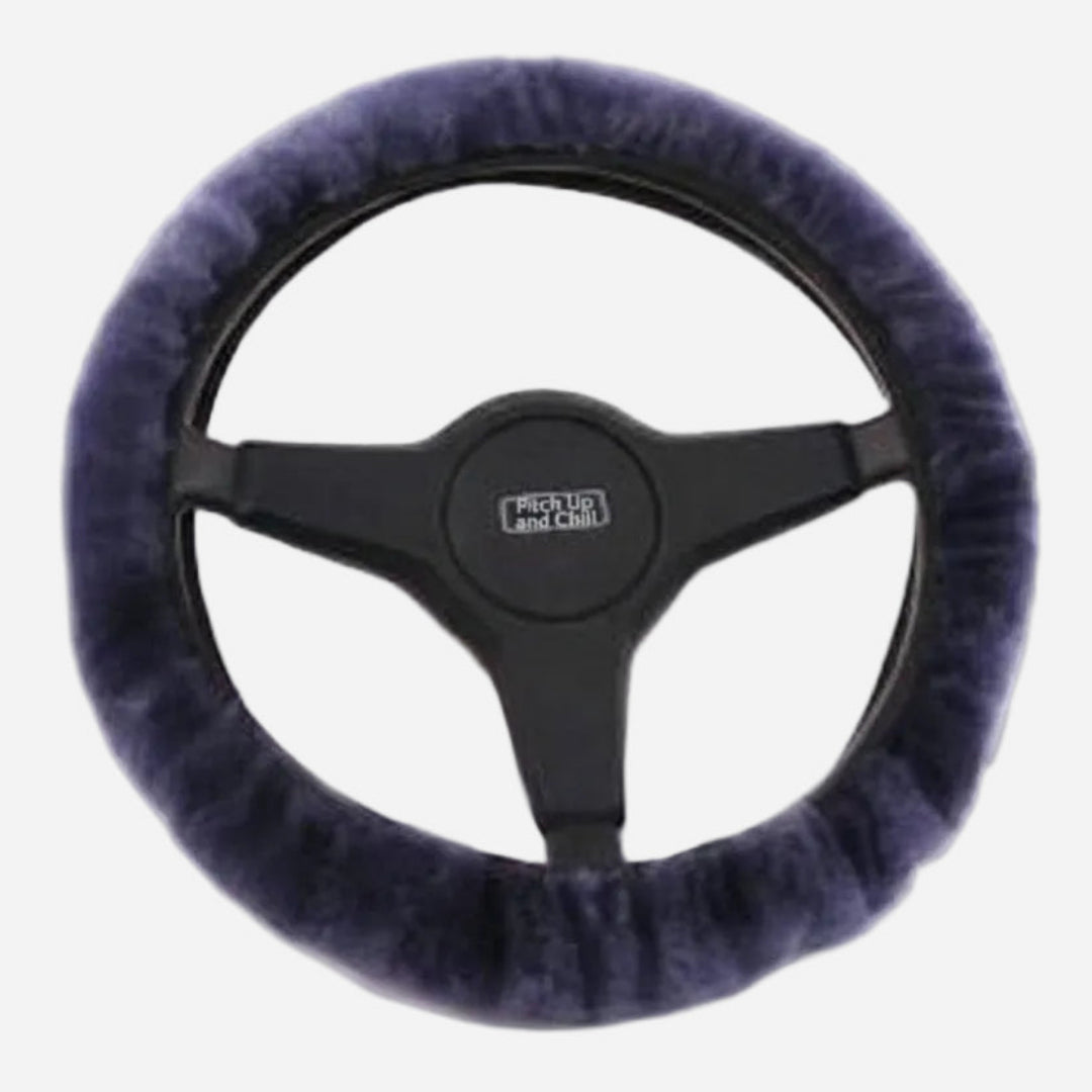 Steering wheel cover with Pitch Up and Chill logo on a light grey background