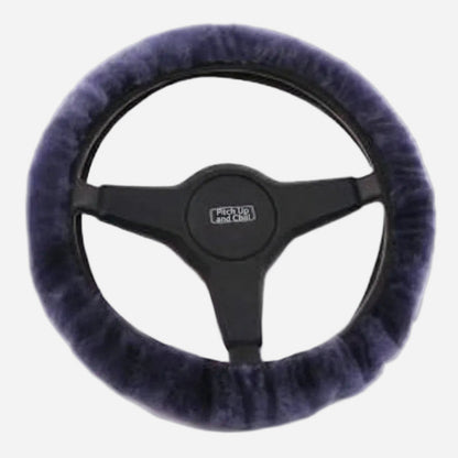 Steering wheel cover with Pitch Up and Chill logo on a light grey background