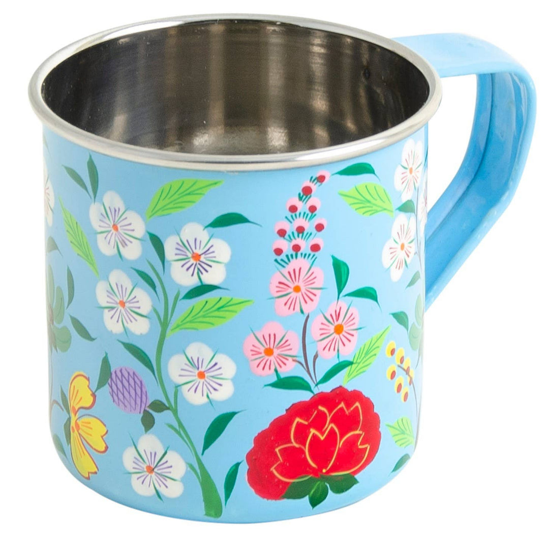 Floral-patterned mug with a blue handle on a white background