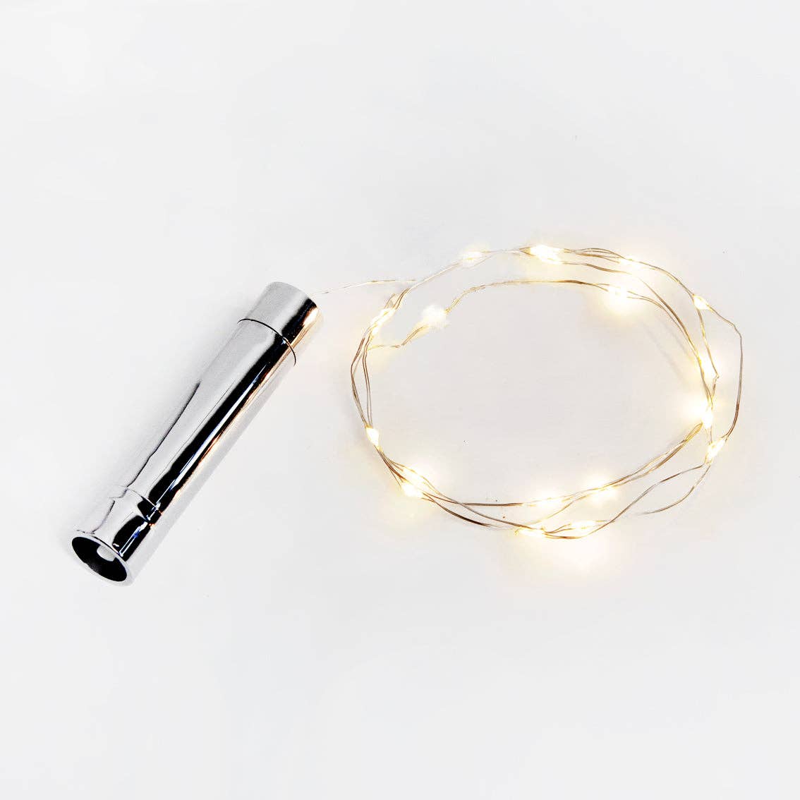 Silver bottle opener with a string of small lights on a white background