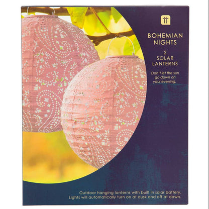 Box of Bohemian Nights solar lanterns with pink lanterns on a white background