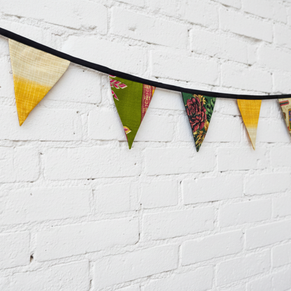 Colorful triangle-shaped bunting flags on a white background
