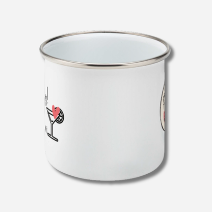 Side view of white enamel mug with cocktail illustrations on a white background