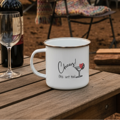 White mug with 'Cheers! This isn't tea' text and a cocktail graphic on a white background
