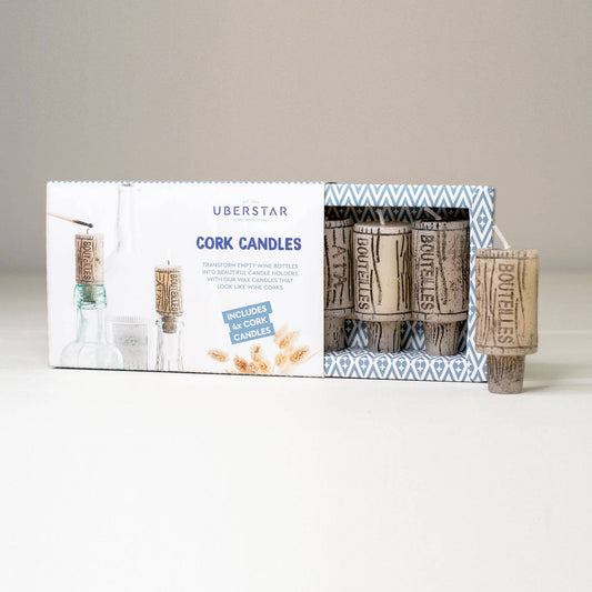 Box of four paraffin wax candles resembling corks that fit into empty wine bottles.