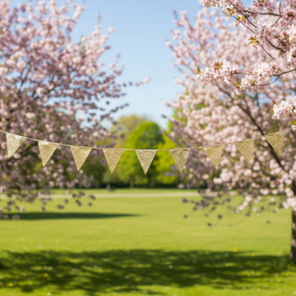 gold glitter bunting on a spring green background