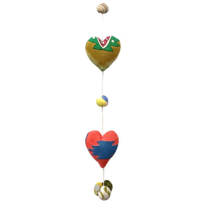 Colorful heart-shaped hanging decoration with a white background