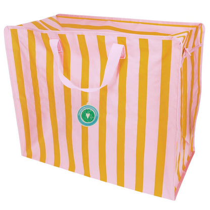 Striped pink and orabgestorage bag with a green tag on a white background