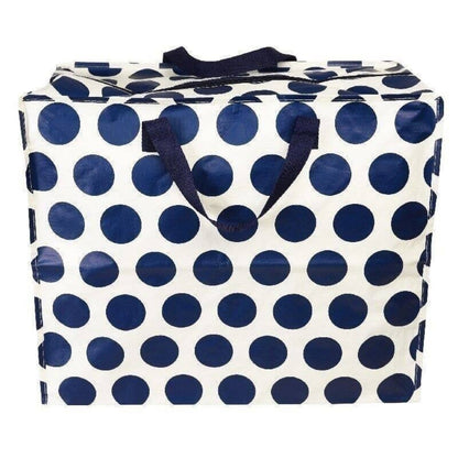 White bag with blue polka dots and a navy nylon handle on a white background