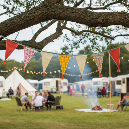 Colorful paisley print fabric bunting with triangular flags festival background