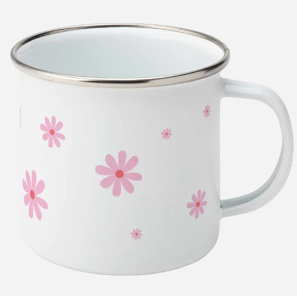white enamel mug with pink daisy flowers of varying sizes and handle to the right.