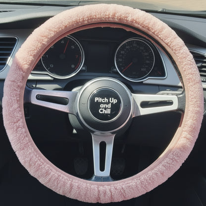 Steering wheel with a light pink sheepsking cover