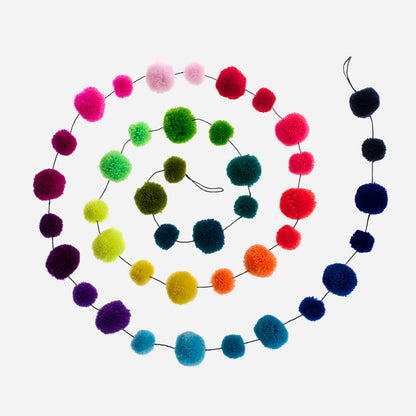 Colorful pom-pom garland on a white background