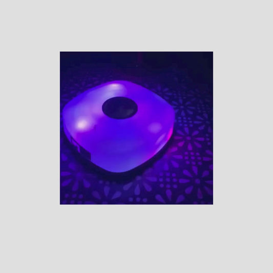 light box in the dark with flashing multicolours