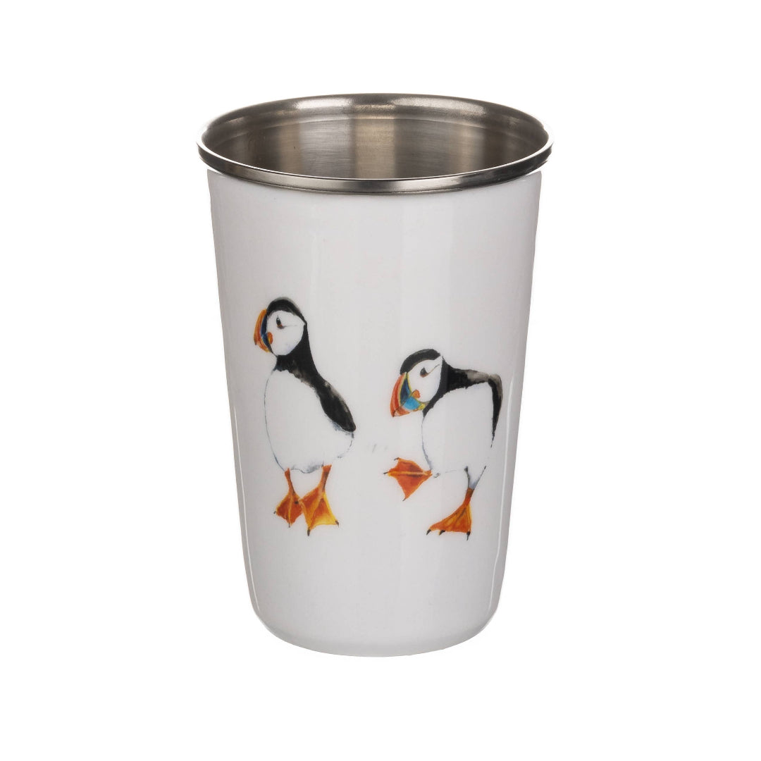 Stainless steel tumbler with puffin design on a white background