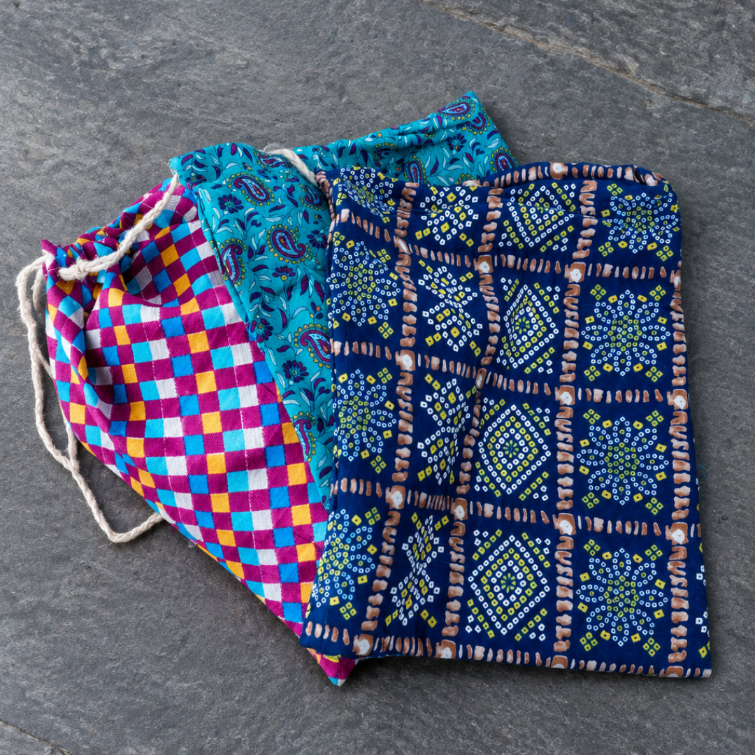 fan of three colourfulrecycled sari gift bags with hessian draw string 32cm x 40cm