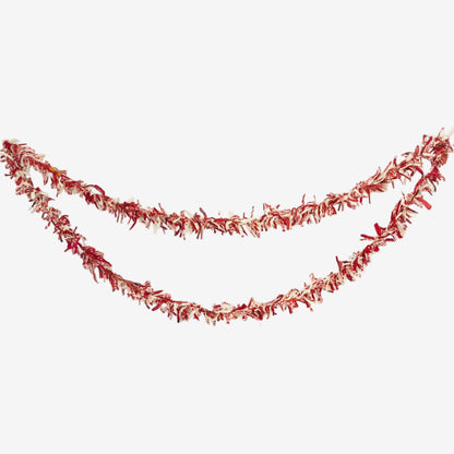 Red and white tinsel garland draped in two curved rows against a plain white background.
