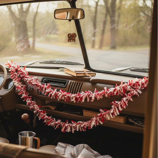 Red and white tinsel garland draped in two curved rows against a plain white background.
