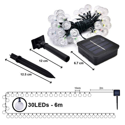 Solar string lights with measurements and components on a white background