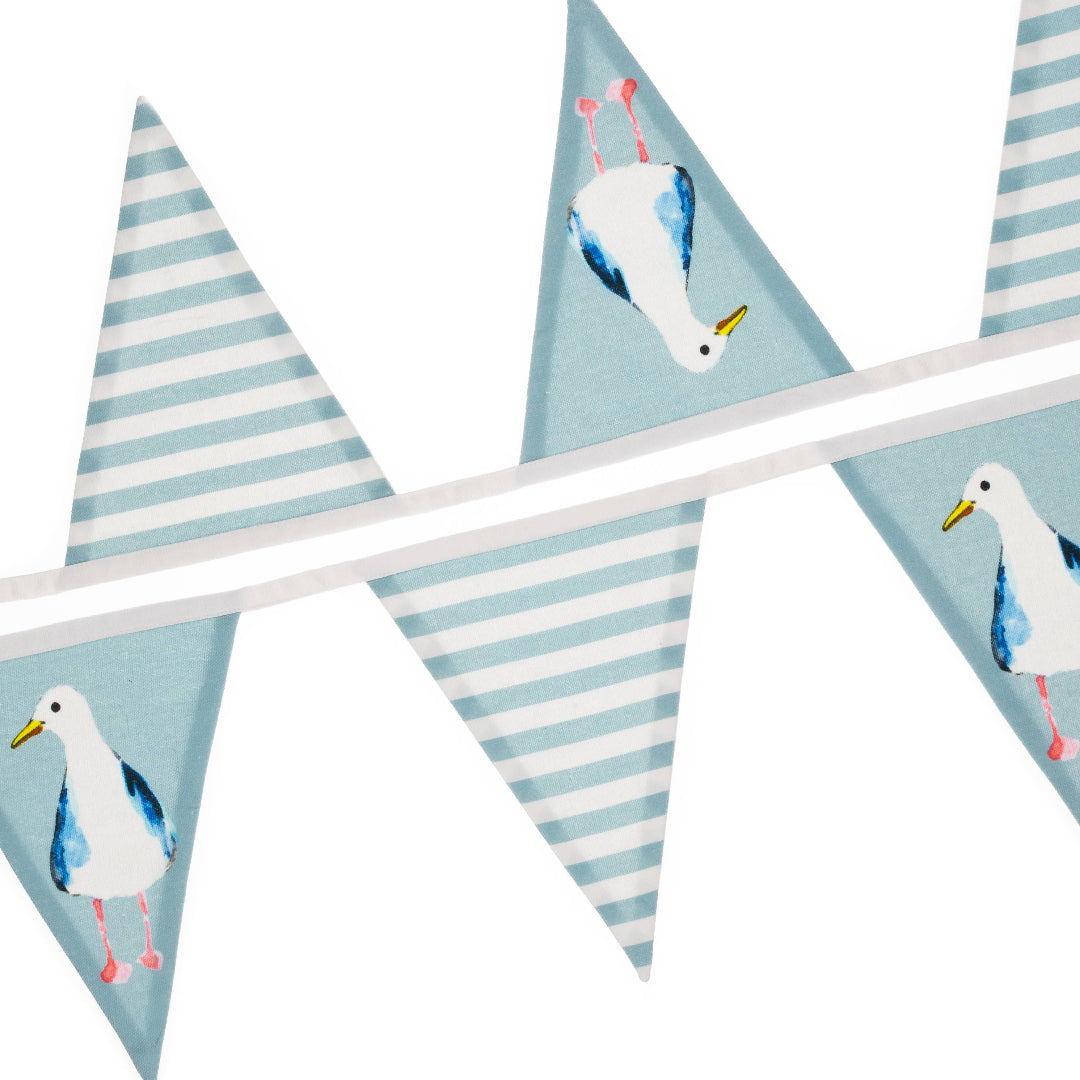 Bunting flags with seagull  and blue stripe designs on a white background