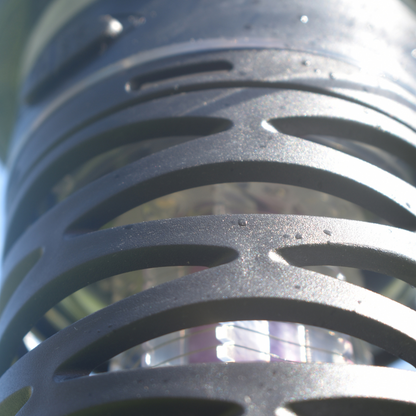 Close up of black lantern casing with internal insect killer