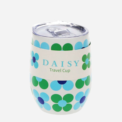 Beautiful white travel cup with green and blue daisy print and clear plastic lid with hole for sipping or straw.